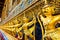 Garuda,The statues of Krut battling naga serpent, a Thai Buddhist adaptation of Garuda in Wat Phra Kaeo temple, Bangkok, Thailand