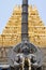 Garuda, the vehicle of the Hindu god Vishnu facing the Chennakesava temple, Belur, Karnataka. East Gopura, tower over entrance, is