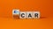 Gas car or e-car symbol. Turned a cube and changed words `gas car` to `e-car`. Beautiful orange background, copy space. Busine