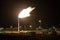 Gas flame torch on a oil refinery plant