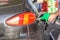 Gas nozzle. Fills petrol on gas station. Transport energy, transportation concept