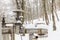 Gas pipes and valves in a snowy forest