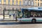 Gas powered bus stopped in a bus stop in front of the Portuguese Electricity and Photography Museum in Porto, Portugal