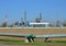 Gas Processing Plant. Power pipes and industrial refinery towers of natural gas factory on the background blue sky. Oil drill rig