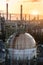 Gas storage spheres tank in oil refinery plant at sunrise