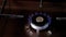 gas stove burner with russian ruble on top burning natural gas with blue flame