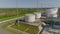 Gas tanks with pipeline at refinery complex upper view