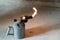 Gasoline blowtorch with a burning fire, the use of a blowtorch in construction.