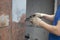 A gasoline blowtorch.Using a gasoline blowtorch to clean old paint from metal surfaces. Preparation for painting