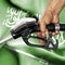 Gasoline consumption concept - Hand holding hose against flag of Saudi Arabia