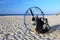Gasoline engine and propeller with protection for paragliding sail on the beach