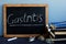 Gastritis written on a blackboard in a hospital.