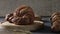 Gastronomic session of bakery, pastry. a croissant spins in the foreground, next to another croissant and other pastries