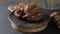 Gastronomic session of bakery, pastry. a croissant spins in the foreground, next to another croissant and other pastries