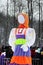 GATCHINA, RUSSIA - FEBRUARY 18, 2018: Traditional Maslenitsa Scarecrow on seeing Russian winter on last day of Shrovetide. Viewers