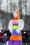 GATCHINA, RUSSIA - FEBRUARY 18, 2018: Traditional Maslenitsa Scarecrow on seeing Russian winter on last day of Shrovetide. Viewers