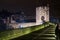 Gate on bridge in night. Besalu