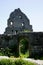 Gate and building facade grey stone castle ruin