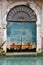 Gate damaged by the Venetian waters, Venice, Italy