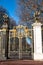 Gate with gilded ornaments in Buckingham Palace, London, UK