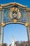 Gate with gilded ornaments in Buckingham Palace, London, UK