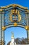 Gate with gilded ornaments in Buckingham Palace, London, UK