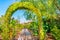 A Gate leads to a vineyard garden in Temecula Valley.