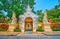 The gate and Singha lions sculptures of Wat Phra Singh, Chiang Rai, Thailand