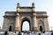 Gate way of India monument written close zoom view.