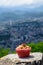 Gateau Grenoblois, French Walnut Coffee Cake, specialty from Grenoble and view on central part of Grenoble city from Bastille