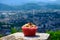 Gateau Grenoblois, French Walnut Coffee Cake, specialty from Grenoble and view on central part of Grenoble city from Bastille