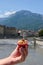 Gateau Grenoblois, French Walnut Coffee Cake, specialty from Grenoble and view on central part of Grenoble city witn mountains