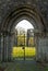 Gated archway entrance at Dundrennan Abbey, a medieval abbey, Scotland