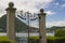The gates to paradise. Beautiful black gate on the waterfront of Lugano, Switzerland.