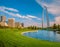 The Gateway Arch stands tall above the trees and buildings in Missouri