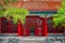 Gateway with red Chinese doors