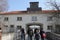 Gateway to hell - the innocuous entrance to Hitler`s infamous Dachau `death` camp