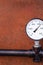 Gauge pressure measurement system of gas supply closeup iron background