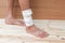 Gauze bandage the foot treating patient ulcers male is wrap his