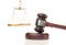 Gavel in action and scale of justice