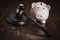 Gavel and Piggy Bank on Table