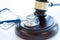 Gavel and stethoscope. medical jurisprudence. legal definition of medical malpractice. attorney. common errors doctors