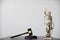gavel wood and Brass court scales are used to decorate a table in a legal advisor office for aesthetic reasons ,Because the brass