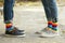 Gay couple with colorful socks outdoors