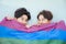 Gay Couple with Rainbow Flag stock photo on bedroom