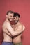 Gay couple, shirtless posing in a studio, photo-shoot