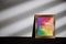 Gay, Homosexual, LGBTQI Concept. Rainbow Color picture with Pride Text in Photo Lying on the Floor