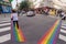 Gay pride flag crosswalks in Paris gay village Le Marais