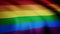 The gay pride rainbow flag waving in slow motion, seamlessly looped, close up, isolated on alpha channel with black and
