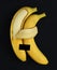 Gay relationship. concept. A yellow banana with its skin hugs another banana. Black background Gay relationship. LGBT people. Anxi